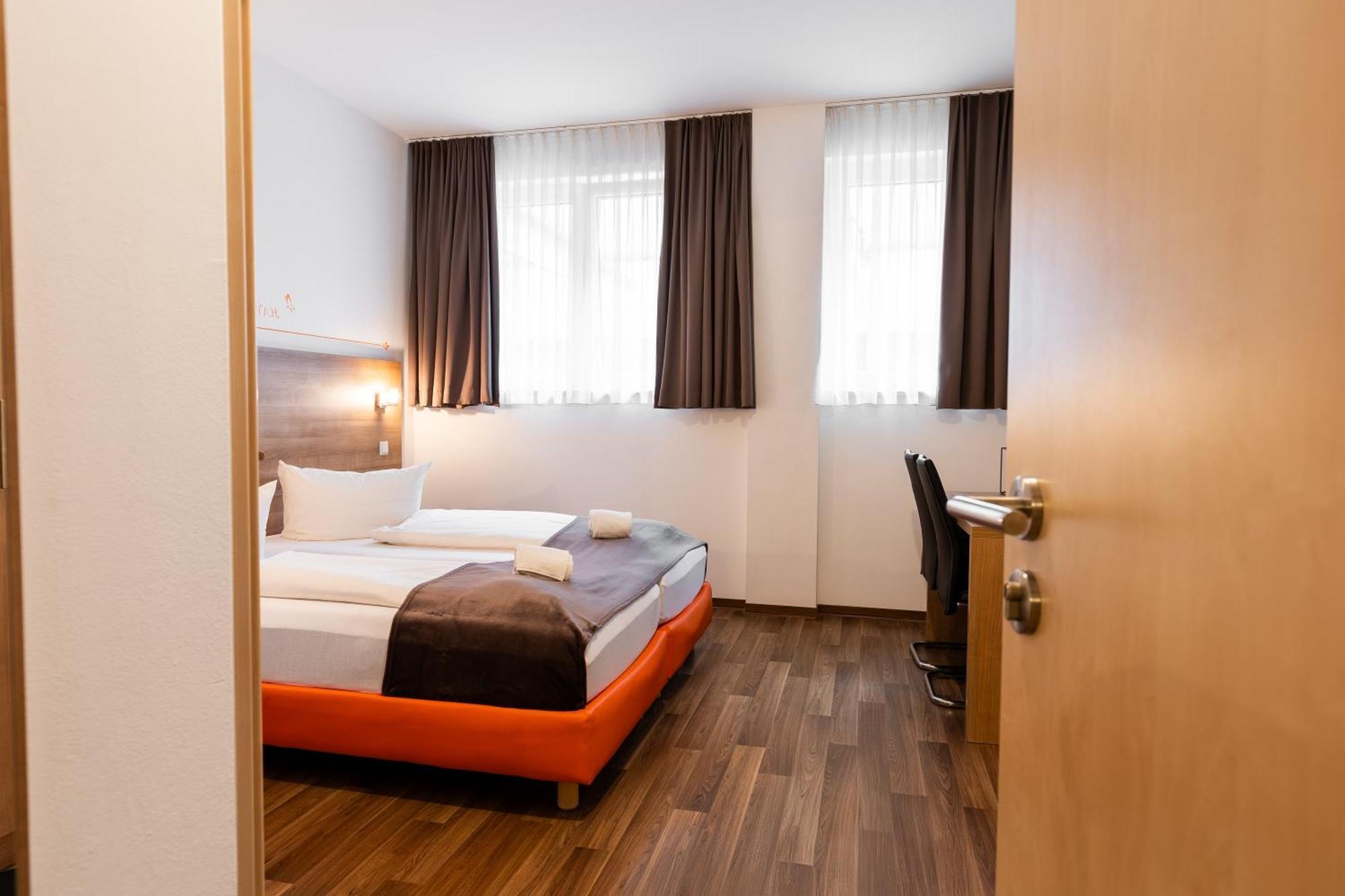 Orange Hotel Und Apartments Neu-Ulm Bagian luar foto